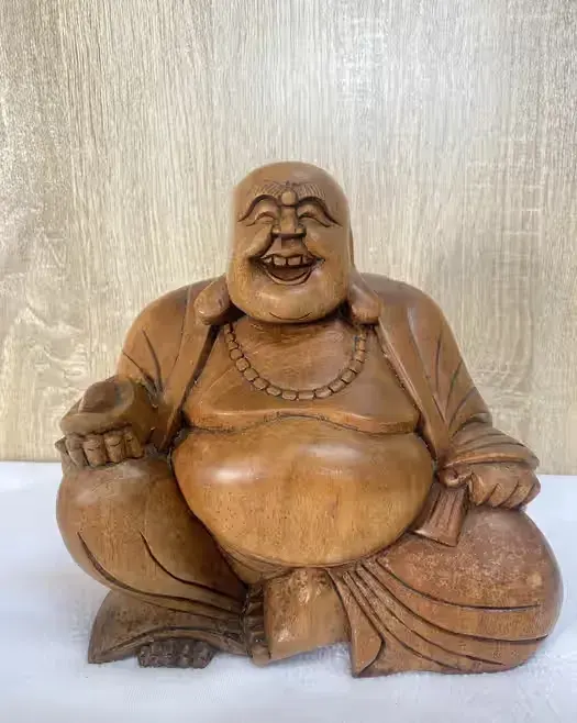 Figurka drewniana Budda — praca twórcy Krystyna na Freshwall Marketplace