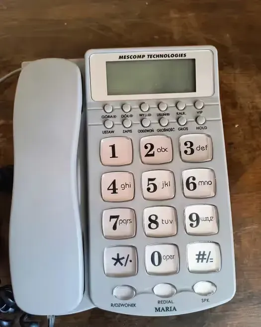 Stary telefon analogowy mescomp technologies — praca twórcy Krzysztof na Freshwall Marketplace