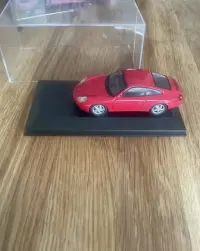 Porsche 911 996 schuco czerwone 1:43 — ujęcie 3