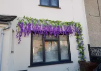 Wisteria glicynia sztuczna girlanda kwiatowa dekoracja 12 sztuk — ujęcie 2