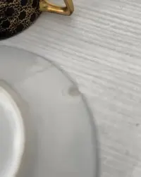 Filiżanka ze spodkiem Rosenthal kobalt z złotą siatką — ujęcie 4