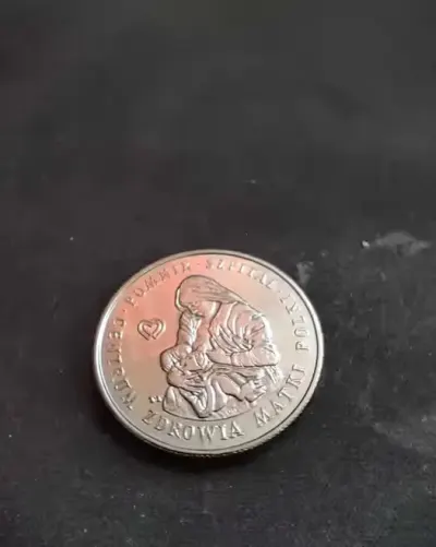 Moneta 100 zł z 1985 r — praca Eryk, Toruń