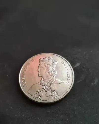 Moneta nominał 100zł 1985r — praca Eryk, Toruń