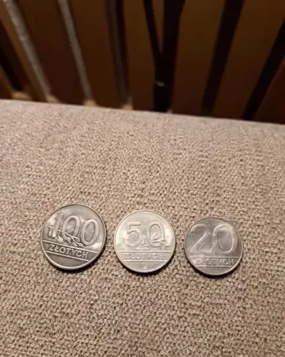 Monety 100, 50, 20 zlotych z 1990 roku — praca Zbigniew, Toruń