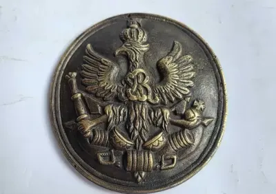 Plakieta Orzeł Stanisław August Poniatowski z armatami i szablami (owalna) — praca Kamil, Łódź