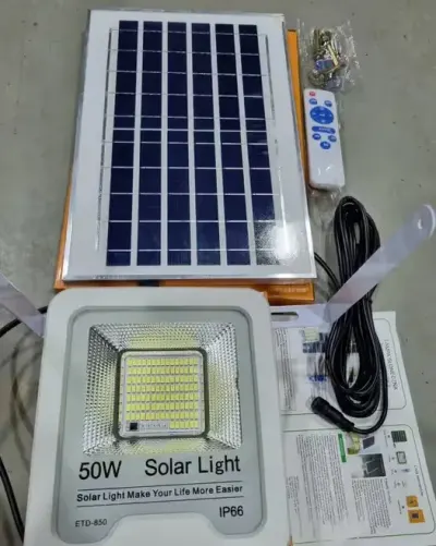 Lampa solarna VÖGLER GmBh 50W neutral, sensor zmierzchu — praca Centrum Handlowo-Usługowe Marek Karaś, Jasło