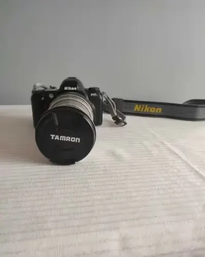 Aparat fotograficzny Nikon — praca Henryk, Szczecin